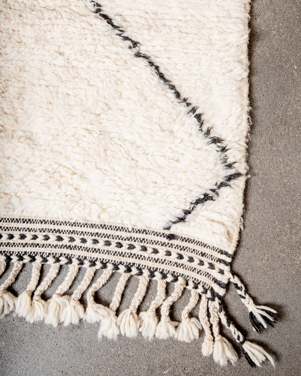 Modern, designer, handcrafted Berber rug from Morocco. Beniourain carpet with minimalist design, natural wool pile and a fluffy texture.